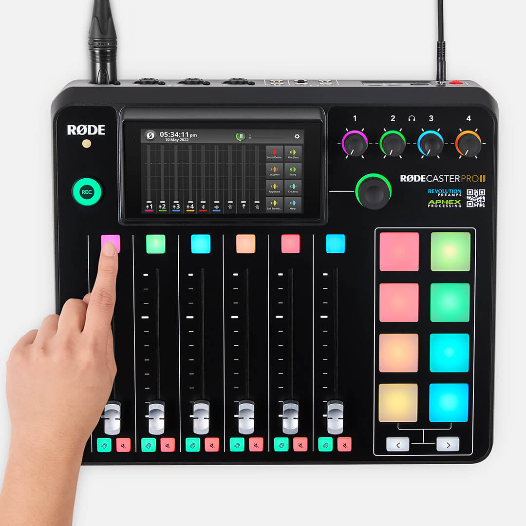 Finger pressing microphone channel 1 on RØDECaster Pro II